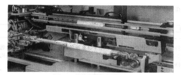 Fig. 3-106 Connection Between Powder Spray Arm and Welding Arm